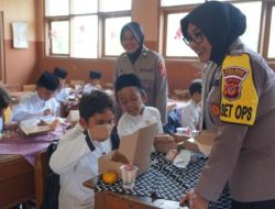 Polres Tasikmalaya Kota Bagikan Makan Siang Bergizi untuk Siswa SDN Hegarsari